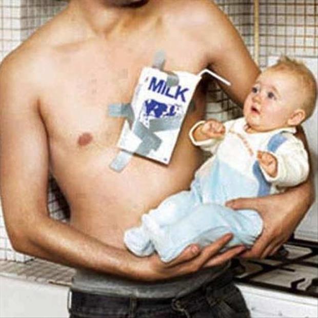dad breastfeeds his baby
