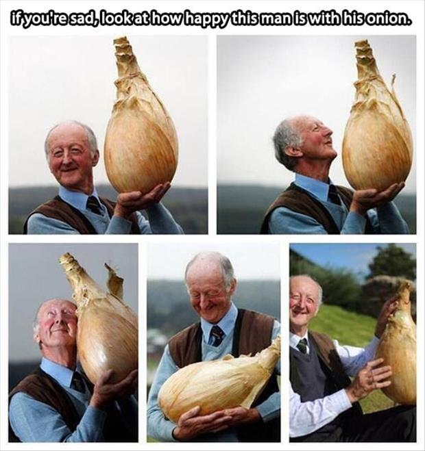 man is happy with his onion