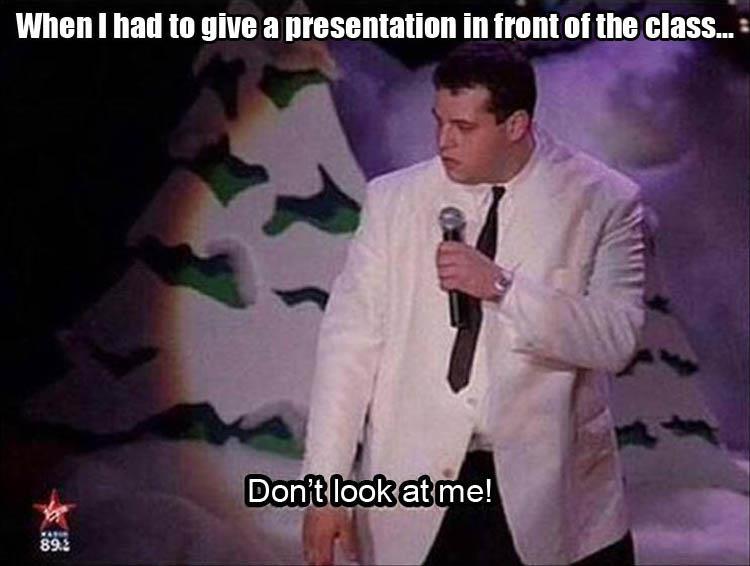 standing in front of the class