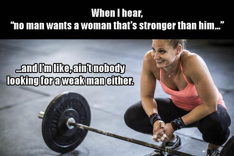 woman rest in between weightlifting sets