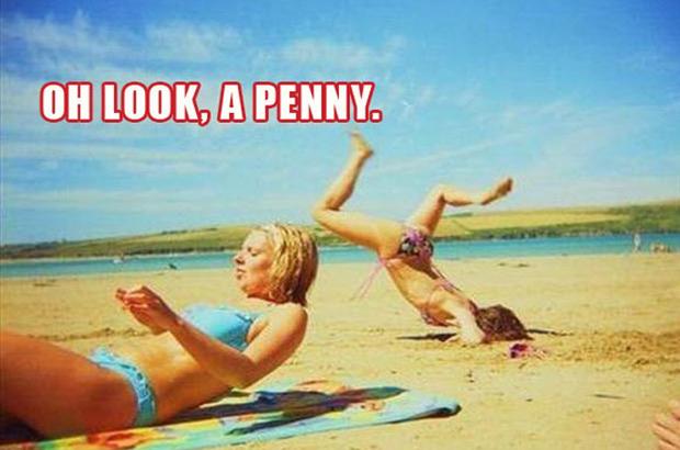 oh look a penny, woman tripping on the beach.
